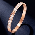 Rose gold titanium steel bangle with mother of pearl inlay and three accent diamonds - Shell Bangle / Rose Gold