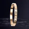 Elegant 6mm wide rose gold titanium steel bracelet featuring engraved Roman numerals design - Roman Numeral Style (32-D-13) / 6mm Width / Rose Gold