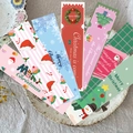 Set of Christmas themed bookmarks featuring Santa Claus and snowman patterns on cardstock - Christmas Series