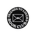 Round black enamel pin featuring Friends to Lovers Book Club text and heart envelope - Friends To Lovers Book Club (xz9840)