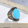 Vintage punk men's ring with oval blue stone and golden floral relief on silver band - US 7 / Two-tone Blue Stone