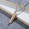 Polished rose gold cylinder capsule pendant with silver box chain on grey stone slabs - Pendant Only (No Chain) / Rose Gold