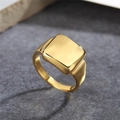 Polished gold square signet ring in minimalist stainless steel on stone background - US 7 / Gold