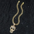 Hip-hop goudkleurige Cubaanse ketting met een met zirkonia bezette schedelhanger - Kettingset / Goud