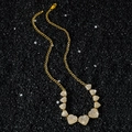Collana a catena classica hip hop dorata con cuori di cristallo su sfondo di pietra nera - 52cm / Oro - Collana