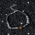 Tigerauge-Steinarmband mit silbernen Metallstücken und Bambusrohr-Elementen für Damen - Bambus-Kugel-Spleiß-Stil