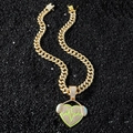Iced-out heart headphone pendant on a gold cuban link chain for men in hip hop style - Heart Headphone Set / Gold