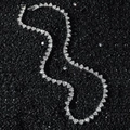 Icy silver heart tennis chain necklace with full crystal rhinestones on black background - Silver - Necklace (45 cm)
