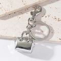 Schlüsselanhänger aus Zinklegierung in Handtaschenform mit poliertem Silberfinish - Silber