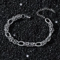 Retro hip-hop titaniumstalen kettingarmband met getextureerde schakels op zwarte steen - Zilver