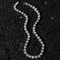 Collana tennis hip hop da 8 mm con pavé di diamanti rotondi su sfondo di pietra scura - Argento - Collana (45 cm)