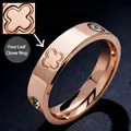 Elegant rose gold stainless steel ring featuring clover engraving and sparkling crystals - Size 7 / Four-Leaf Clover Style / Rose Gold