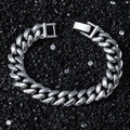 13mm silver Cuban link chain bracelet with secure buckle clasp on black stone background - Silver-Bracelet (20.5cm)