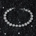 8mm silver tennis bracelet with round halo diamonds and secure clasp on black sand - Bracelet (20cm) / Silver