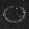 Hip hop style stainless steel bracelet with hollow heart links on black stone background - Bracelet (20.5 cm)