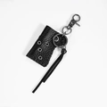 Funda de cuero negro retro para encendedor con ojales metálicos y borla decorativa - Negro