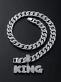 Detail of iced out Cuban link chain with sparkling KING letter pendant in silver finish - Silver Pendant + 50cm Cuban Chain/14mm