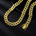 Close-up of a 13mm gold plated Cuban link necklace featuring iced-out pavé crystals - 50cm / Gold