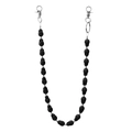 Detail of matte black skull beads on a hip-hop chain with silver metal clasps - Black