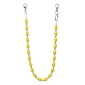 Detail view of yellow matte skull keychain with dual silver lobster clasps for jeans - Yellow