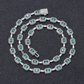 Elegante smaragdgroene zirkoon ketting met rechthoekige steen en diamanten accenten - 20 inch / Platina Smaragd