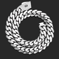 Close-up of polished silver Cuban link chain with a diamond-encrusted box clasp and S logo - US 15 / EU 22 / Platinum