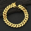 Close-up of polished gold Cuban link chain bracelet with secure buckle closure - 12mm x 17.78cm / Gold