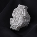Macro shot of silver hip-hop dollar sign ring with sparkling full pavé set stones - Silver