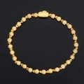 Detailed view of 4mm gold-plated 925 silver beaded bracelet with sparkling moissanite stones - Gold