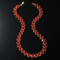 Hip hop ketting met rode kristallen schedels en gouden afwerking op zwarte ondergrond - Goud (Rode Diamant Schedel) - 20inch