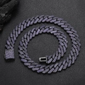 Macro shot of 15mm gunmetal Cuban link chain with purple pavé-set cubic zirconia stones - Purple
