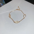 Gold charm bracelet with three Ruyi cloud pendants set with sparkling zircon stones - Bracelet - Golden Gourd