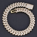 Detailed close-up of iced-out gold Cuban link necklace with rhombus links and square clasp - 22 inch / Gold