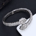 Macro shot of silver-tone Hamsa Hand bracelet with pave-set cubic zirconia stones - 8 Inch (White Gold)