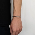 Bracelet pour homme en acier inoxydable avec une chaîne torsadée au design minimaliste - Largeur 4mm-Longueur 22.86cm / Acier