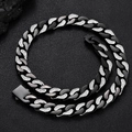 Detail of 12mm dual-tone black and iced-out silver Cuban link chain with square clasp - Two-tone Steel Inlaid