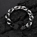 Macro view of 12mm Cuban link bracelet with matte black rings and inlaid zircons - Two-tone Steel Inlaid