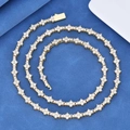 Golden tennis chain necklace with repeating star patterns and sparkling white zircon stones - Extended Version / Gold