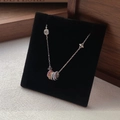S925 sterling silver necklace with five rainbow zircon rings on black display - 925 Silver / White Gold
