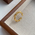 Minimalist S925 sterling silver golden twisted croissant ring with glossy braided texture - Gold