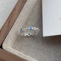 Anillo abierto de plata S925 con circonita azul ovalada y diseño minimalista - Abierto Ajustable / Azul