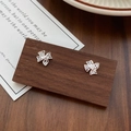 Elegant S999 sterling silver filigree bow stud earrings with screw back closure - 990 Silver / Silver