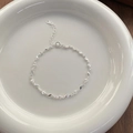 Exquisita pulsera de plata de ley S925 con rosa y hoja sobre plato de cerámica - Plata 925 / Plateado