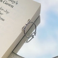 Minimalist S925 sterling silver hollow bow open ring with polished mirror finish - Adjustable Open / White Gold