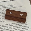 Elegant S999 sterling silver stud earrings with three sparkling zircons on wood - 990 Silver / White Gold