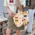 Beige canvas handbag featuring cute cartoon cat prints and brown woven handles - Meow Fairy Tale