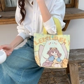 Yellow casual canvas tote bag with cute bear illustration and LEISURELY text - Leisurely Companion