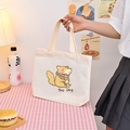 Chic off-white canvas tote bag featuring a cute Shiba Inu illustration with brown scarf - Healthy Dog / Health Dog - Beige