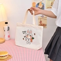 White canvas tote bag featuring cute cartoon rabbit girl illustration with dual handles - Little White Rabbit - Beige