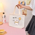 Stylish white canvas tote bag featuring a cute pig illustration and sturdy handles - Little Pig - Beige